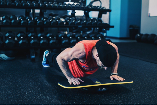 Balance board training for deep core muscle activation.