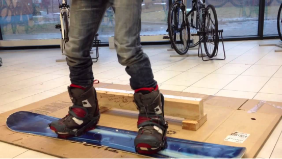 A ski enthusiast practicing balance board training to enhance core strength.
