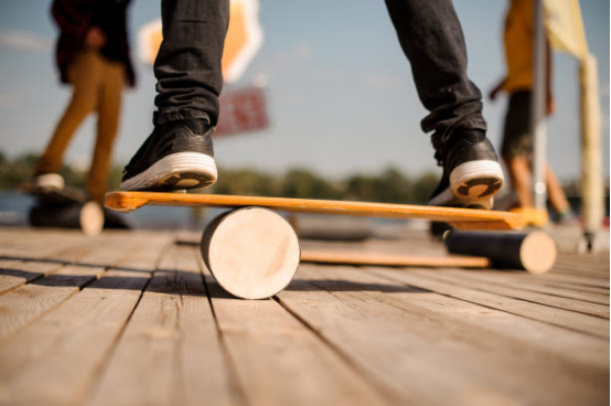 Balance board with foot placement demonstrating core stability training