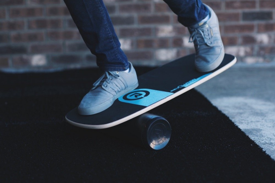 athlete showing balance board progress effortlessly