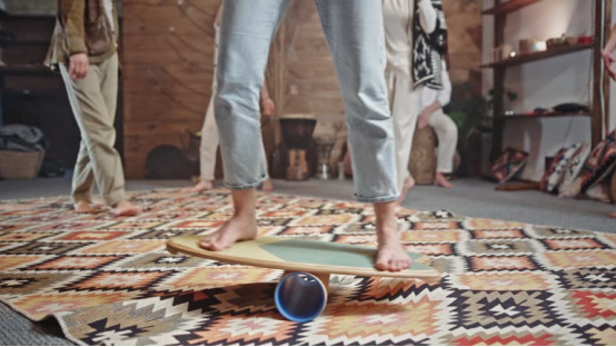 Wooden balance board showing solid stability for core exercises