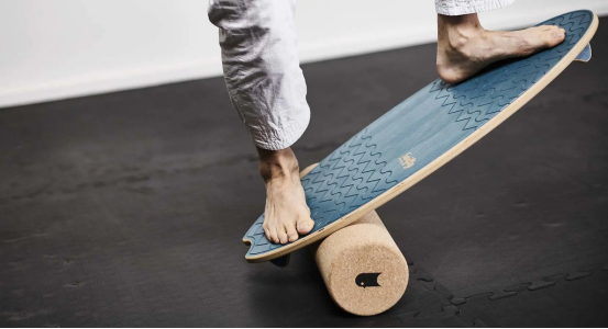older adult practicing balance board gait for stability
