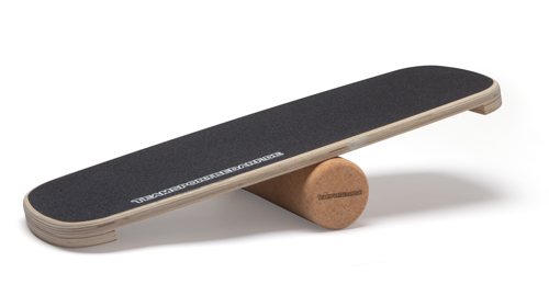 close-up of feet adjusting on a balance board for improved coordination